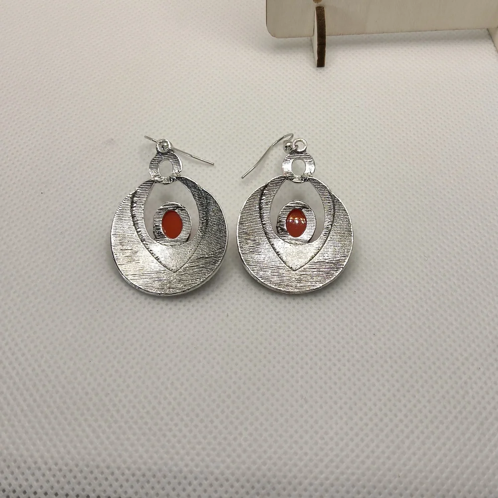 Red and‎ Blue Circular Earrings with Intricate Design